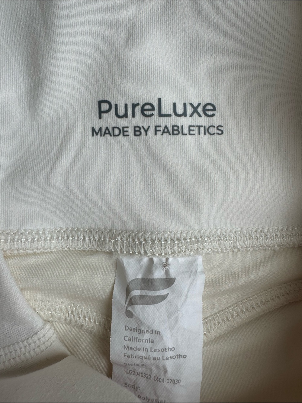 Fabletics Oasis PureLuxe High-Waisted 7/8 Legging Cream - Picture 7 of 9